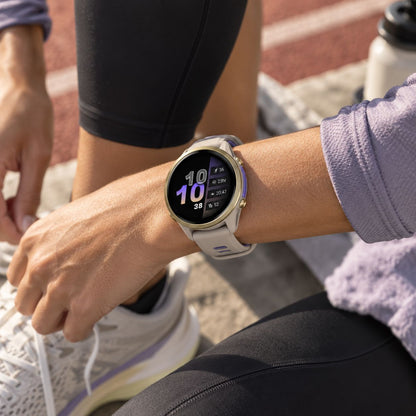 GARMIN Forerunner 970 GPS Running Smartwatch - Soft Gold Titanium with French Grey Case and French Grey/Translucent Indigo Band